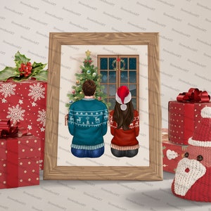 May include: A framed illustration of a couple standing in front of a Christmas tree and looking out a window. The man is wearing a blue sweater with a reindeer pattern and the woman is wearing a red sweater with a snowflake pattern. The couple is standing in front of a Christmas tree with ornaments and lights. The window is decorated with a wreath and the night sky is visible outside.