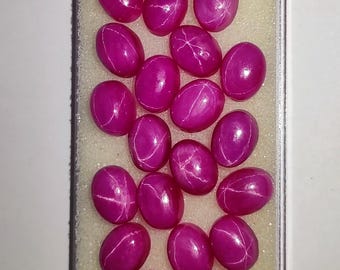 Cabujones de rubí estrella rosa: lote de gemas ovaladas pulidas de 6 x 8 mm.