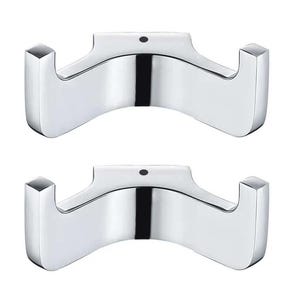 May include: Two silver double hooks for hanging coats, towels, or other items. The hooks are made of metal and have a polished finish.