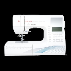 May include: A white Singer Quantum Stylist 9960 sewing machine featuring a digital display screen, a series of control buttons, a needle assembly, and a built-in ruler on the extension table with markings in inches and centimeters.