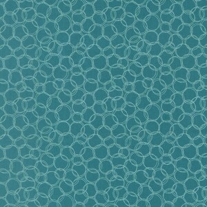 May include: Teal fabric with a repeating pattern of overlapping, light teal circles. The circles are outlined with a thin, white line, creating a textured effect. The fabric has a subtle, woven texture.