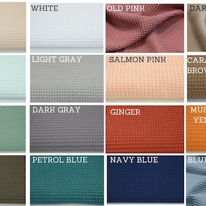 Puede incluir: Muestra de 16 muestras de tejido de tejido de waffle en varios colores, incluyendo beige, blanco, rosa, gris, verde, marr&oacute;n, naranja, amarillo, azul y caqui.