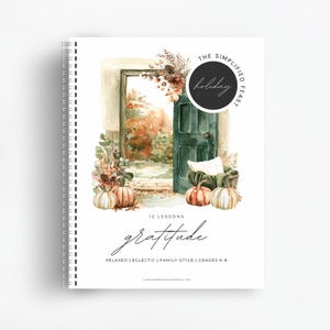 May include: A spiral bound notebook with a watercolor illustration of a door with pumpkins and fall foliage. The title is "The Simplified Holiday Feast" and the subtitle is "12 Lessons in Gratitude".