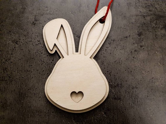Easter magic: Handmade wooden pendant in rabbit shape with heart detail - Size 150 x 100 mm - 2 layers - Perfect Easter decoration