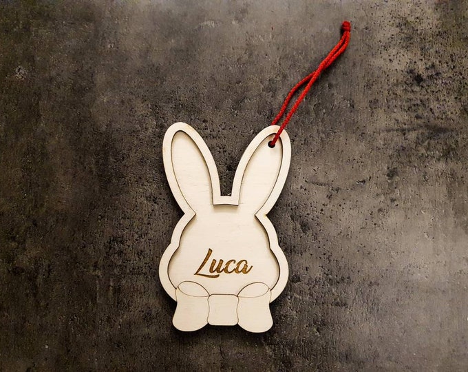 Personalized bunny pendant made of wood, perfect Easter decoration with your desired name lasered precisely. Size: 140x90mm Satisfaction Guarantee!