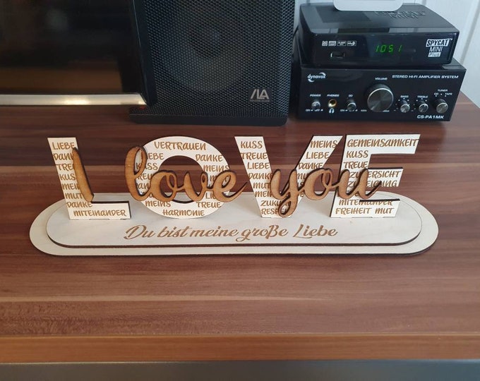 Discover love in wood: Handcrafted 'Love to put' sign - Unique and personal for special occasions! Order now