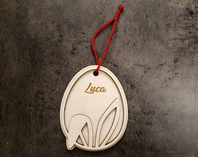 Personalized Easter Egg Pendant: 2-ply birch plywood, 3mm thick, 120x94mm, with bunny ears. Individual laser engraving for desired name