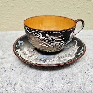 Antique Porcelain Tea Cup and Saucer with Moriage SAJI Dragon Made in Occupied Japan Hand Painted