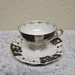 Vintage Wales Tea Cup and Saucer Made in Japan Opalescent Black White and Gold