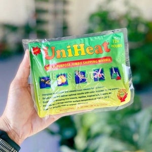 May include: A green and yellow UniHeat multi-purpose jumbo shipping warmer packet. The packet has the text "UniHeat" in red and the text "72+ HOURS". The packet is designed for shipping live insects, reptiles, tropical fish, and flowers.