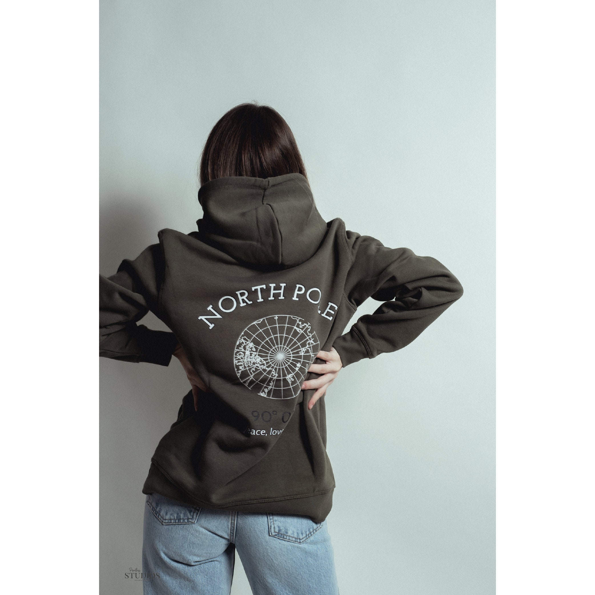 Hoodie Made of Organic Cotton with North Pole Print, Coordinates and Peace, Love and Joy Lettering in Dark Green