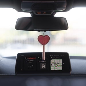 Heart shape lollipop with middle finger car air freshener