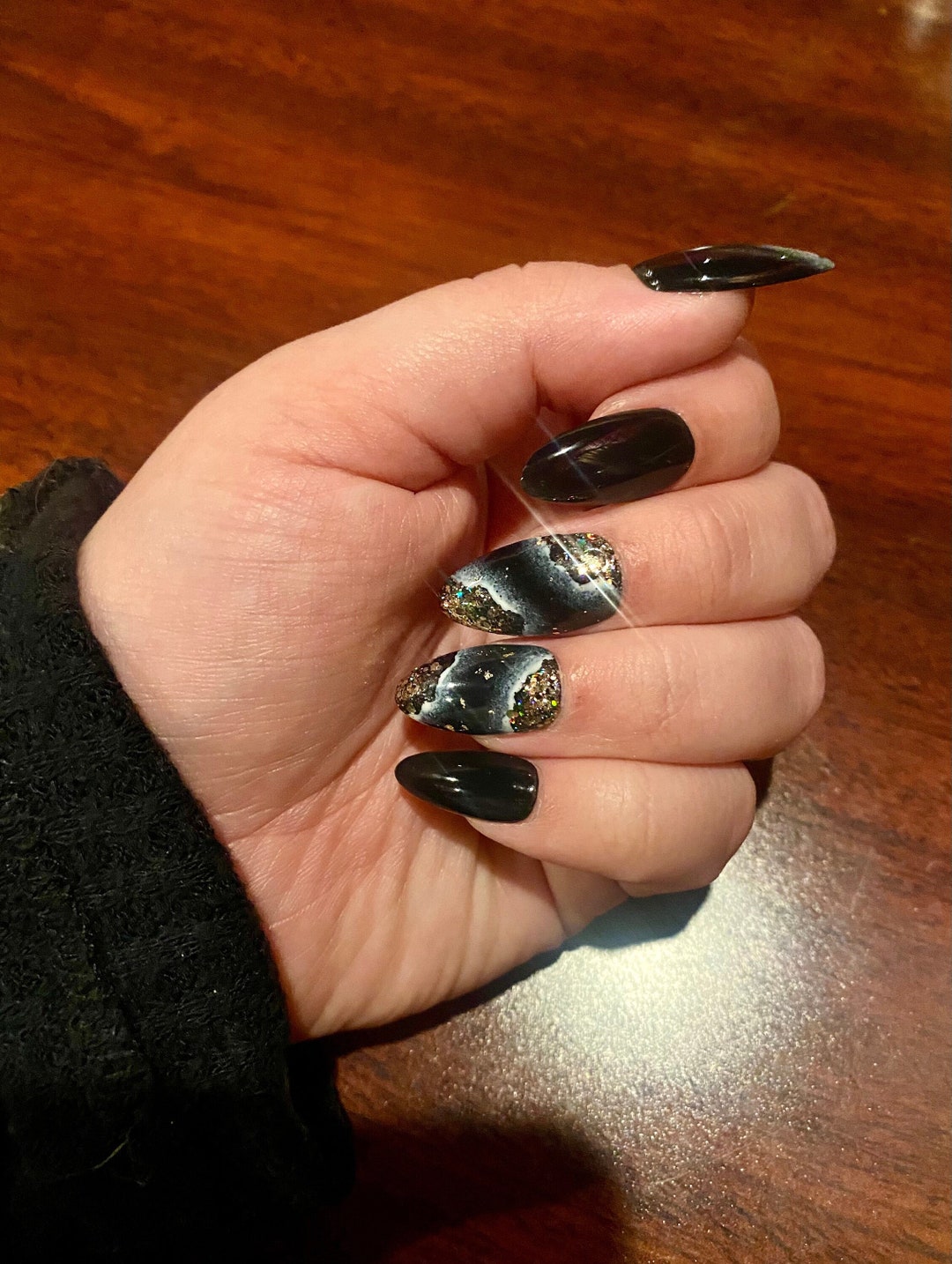Enchanting Black Crystal Nail Trend