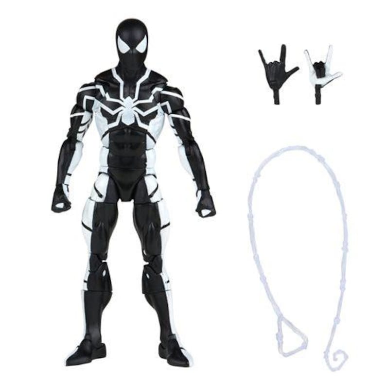 May include: A black and white action figure of a superhero, with a spider emblem on the chest. Includes two interchangeable hand gestures and a white web-like accessory. The figure is approximately 6 inches tall.