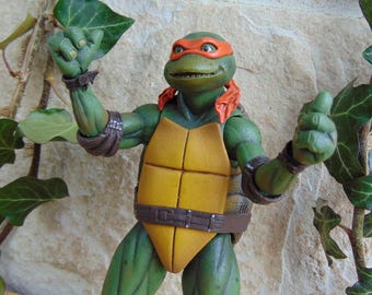 1990 Teenage Mutant Ninja Turtles Movie Live Action Toy Version Michelangelo 7 inch Action Figure Nunchucks Weapon, TMNT Collector Toy