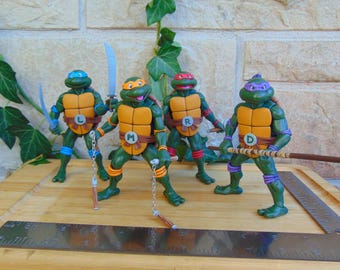 Teenage Mutant Ninja Turtles 7 inch Action Figure Lot, 1990s NECA TMNT Cartoon Versions based on the Classic Animated Series, All 4 Turtles!