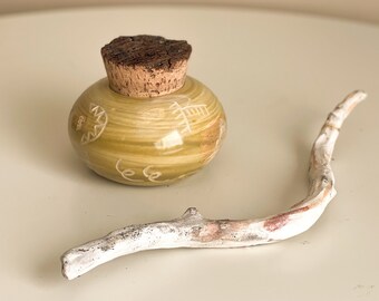 Yellow ceramic jar with cork lid. Salt container. Sugar dispenser