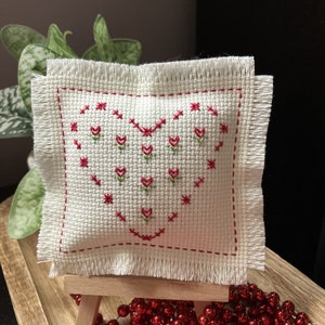 Finished Cross Stitched Mini Pillow -- Hearts Encircled