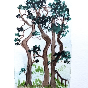 Biglietto di auguri vuoto con alberi di pino ad acquerello dipinto a mano