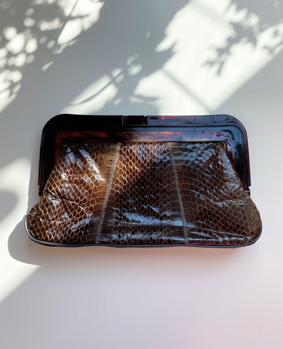 Brown Snakeskin Clutch With Acrylic Handle - image 1