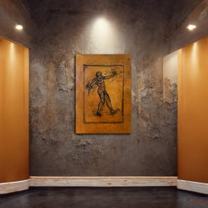 Puede incluir: Pintura abstracta de una figura humana en movimiento, representada con líneas oscuras sobre un fondo marrón dorado. La obra de arte está enmarcada y expuesta en una pared gris texturizada, iluminada por focos, creando un ambiente de galería.