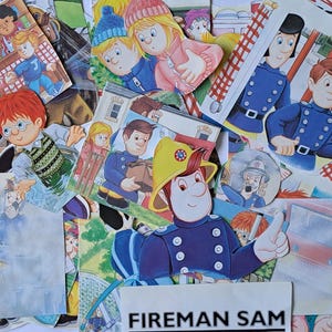 May include: A collection of Fireman Sam paper cutouts featuring various characters in blue uniforms, yellow helmets, and casual clothing. The illustrations depict scenes with a fire truck, children, and adults, with the text FIREMAN SAM at the bottom.