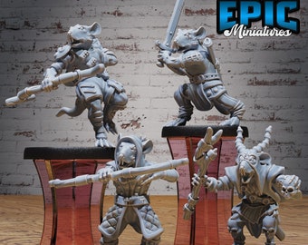 Puede incluir: Cuatro figuras en miniatura pintadas de gris de criaturas parecidas a ratas con espadas, bastones y arcos. Las miniaturas están en posición de combate y se colocan sobre bases negras. Las miniaturas están etiquetadas como "EPIC Miniatures".
