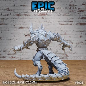 May include: A gray, detailed miniature of a monstrous creature with horns, spikes, and a long, scaly tail. The miniature is posed in a dynamic stance, with its arms outstretched and its tail curled around its legs. The base of the miniature is a circular, textured surface. The miniature is labeled "#5003" and "BASE SIZE: HUGE (76.5MM)".