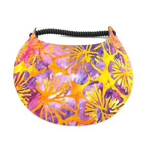 May include: A yellow, pink and purple sun visor with a floral print. The visor has a black elastic band.