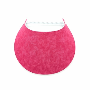 Op de afbeelding: Een roze visor met een wit draadframe. De visor is gemaakt van een textuurdoek.