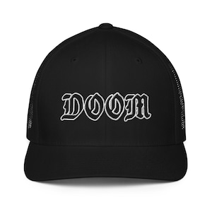 May include: Black trucker hat with a white embroidered "DOOM" in a gothic font.