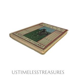 May include: A vintage hardcover book titled "Black Beauty" with the subtitle "In Words of One Syllable." The cover features a black horse on a green field with a blue sky. The book has a beige cover with red and green accents.