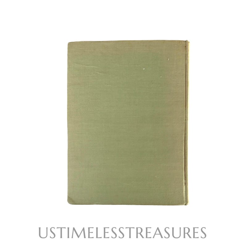 May include: A vintage book with a light green cover. The cover has a textured appearance and a rectangular shape. The text "USTIMELESSTREASURES" is printed at the bottom of the image.