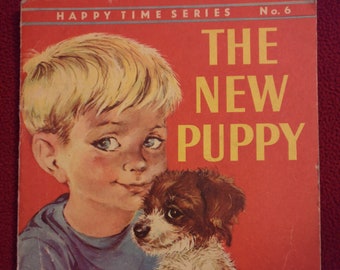 1962 Happy Time Series Buch. Vintage Kinderbuch in englischer Sprache „The New Puppy“. Schöne retro vintage Illustrationen von Lilian Obligado