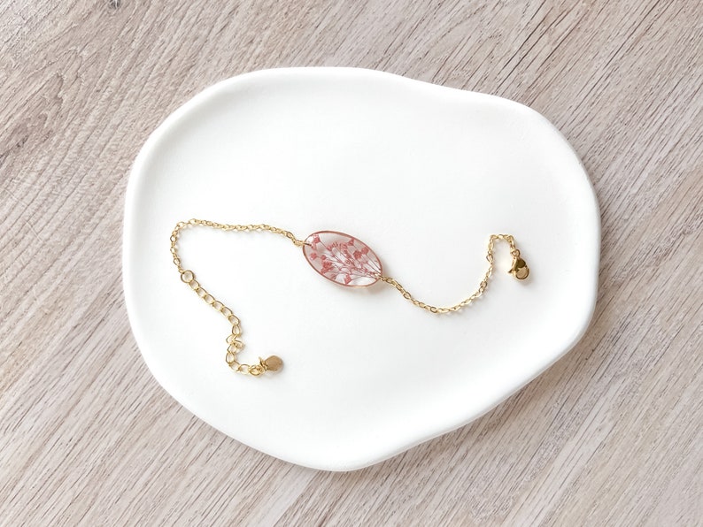 handmade 18k gold plated blacelet with pink pressed flowers preserved in resin