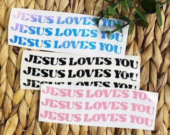 Adhesivo para coche/portátil con el lema "Jesús te ama"