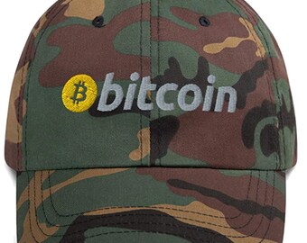May include: A camouflage baseball cap with a yellow Bitcoin logo and the word "bitcoin" embroidered in white.