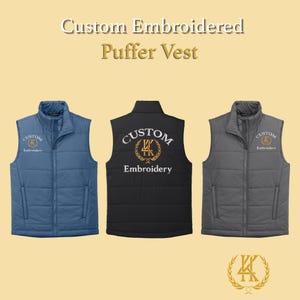 May include: Three custom embroidered puffer vests in blue, black, and grey. Each vest has a full zip and a stand-up collar. The vests feature custom embroidery on the front and back, with the text "Custom Embroidery".