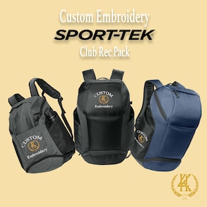 May include: Three backpacks in gray, black, and blue. Each bag has the text "Custom Embroidery" and a logo. The bags are from the Sport-Tek Club Rec Pack collection. The bags have multiple compartments and adjustable straps.
