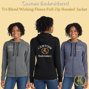 May include: Three full-zip hooded jackets in gray, black, and blue. Each jacket features custom embroidery on the front and back. The jackets are made of a tri-blend wicking fleece material. The text "Custom Embroidered" is displayed on the top of the image.
