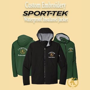 May include: Three waterproof insulated jackets with hoods are displayed. The jackets are black and forest green. Each jacket has the words "Custom Embroidery" and "SPORT-TEK" printed on them. The jackets have a zipper closure and a logo on the chest.