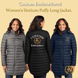 May include: Three long, puffy jackets in gray, black, and navy blue. Each jacket has a high collar and a zipper closure. The jackets are embroidered with the words "Custom Embroidery" and a logo. The text "Custom Embroidered Women's Horizon Puffy Long Jacket" is at the top.
