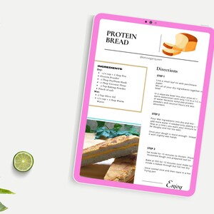 May include: A pink tablet with a recipe for protein bread. The recipe includes ingredients like protein powder, psyllium husk, coconut flour, and baking powder. The recipe also includes directions for making the bread, including mixing the ingredients, baking the bread, and slicing the bread.