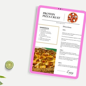 May include: A pink tablet with a recipe for a protein pizza crust. The recipe includes ingredients like protein powder, almond flour, and coconut oil. The tablet also shows a picture of a pizza with toppings. The text on the tablet reads "Protein Pizza Crust" and "Enjoy".