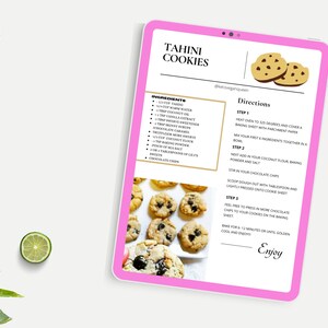May include: A pink tablet screen displaying a recipe for Tahini Cookies. The recipe includes ingredients, directions, and a photo of the cookies. The text on the screen reads "Tahini Cookies" and "Enjoy".