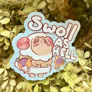 May include: A sticker featuring a cartoon sheep with a worried expression and the text "Swole As Hell." The sheep is light pink and white, with two small bear-like characters. The sticker has a light blue background.