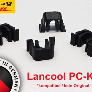 Könnte beinhalten: Vier schwarze Kunststoffclips, vermutlich für ein Computergehäuse, werden vor weißem Hintergrund gezeigt. Der Text "Lancool PC-K7" ist rot dargestellt, zusammen mit "Made in Germany."