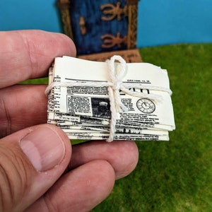Gnome newspapers or stacks of newspapers as accessories for Gnome parade or for Gnome pranks, Gnome accessories, Gnome parade