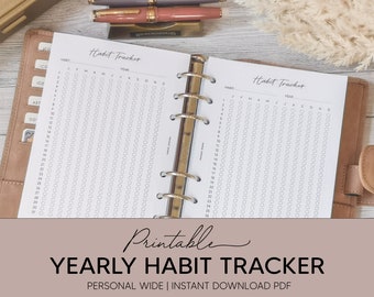 May include: A printable yearly habit tracker in a personal wide size. The tracker has a grid with circles for each day of the year, labeled with the months and days of the week. The text "Habit Tracker" appears at the top of the page.