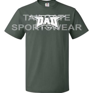 May include: A dark green t-shirt with a white star and the text "BEST DAD EVER" in a distressed font.